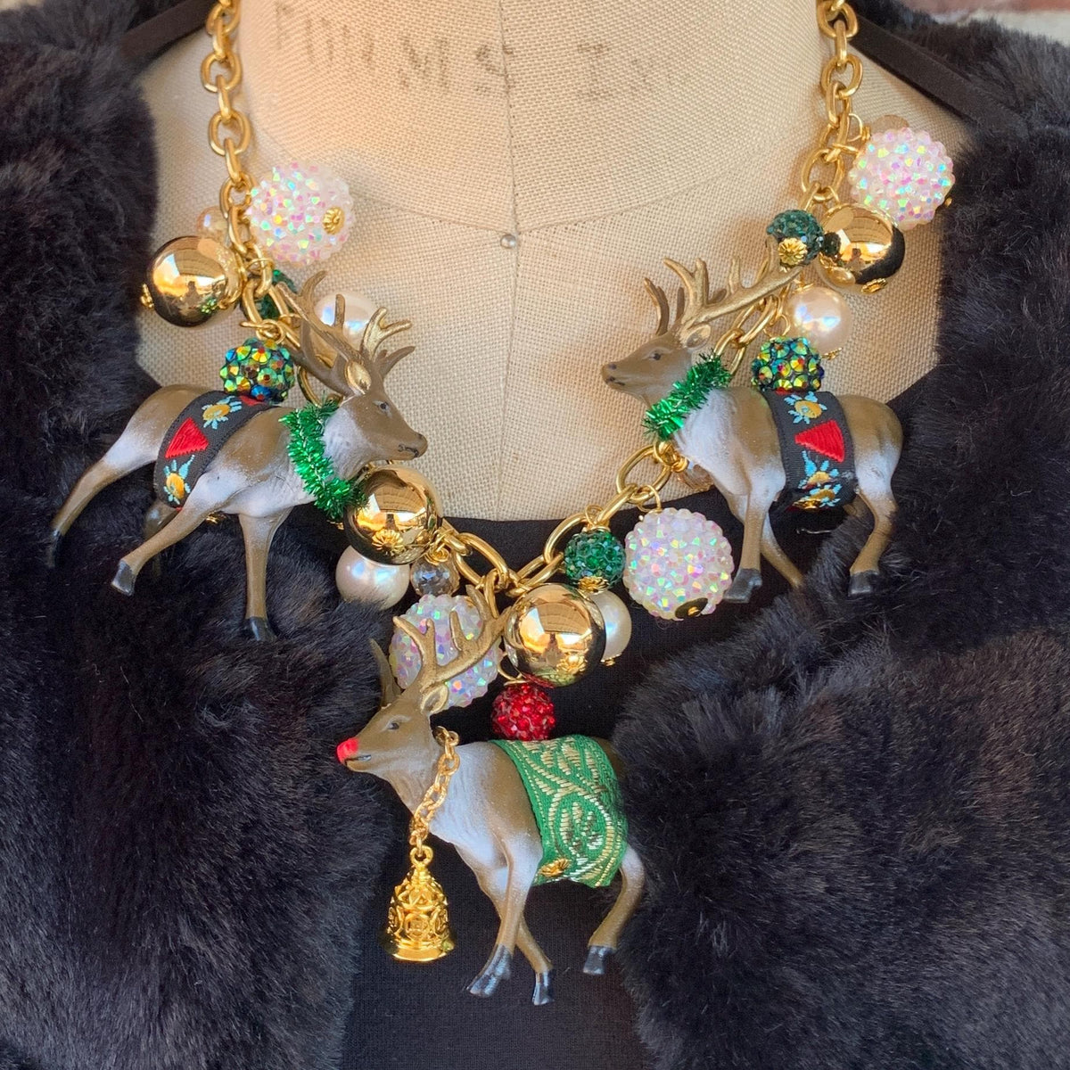 Festive red and green Christmas jewelry with gold accents