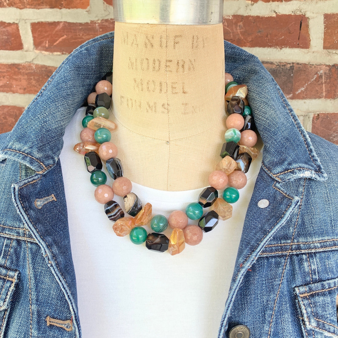 Chunky agate necklace. Two strand statement necklace with polished natural stones in tan, black and green.