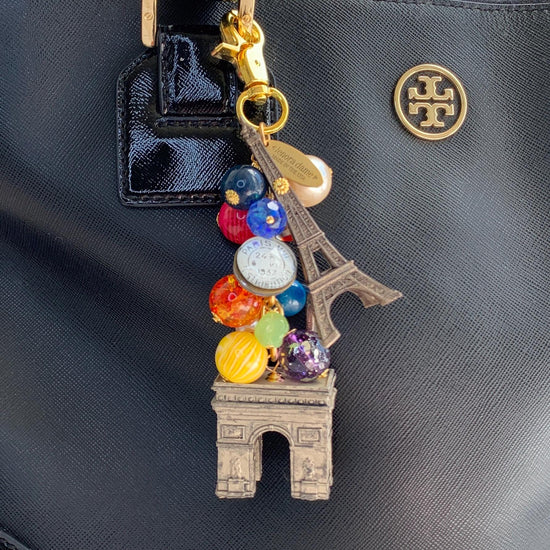Paris bag charm with colorful beads, Eiffel Tower charm, and Arche de Triomphe charm. Paris keyring for women.