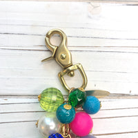 bag charm trigger clasp.