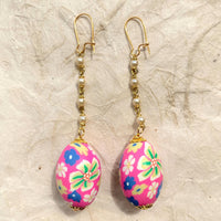 Lenora Dame Easter Egg Earrings. Cute earrings for spring. Floral egg shaped fimo beads, pearl chain dangle from French ear hooks. 