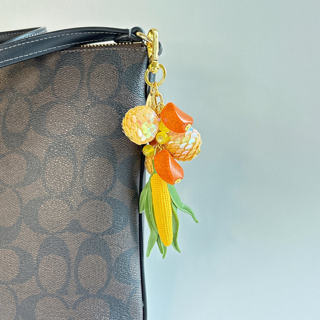 Lenora Dame Corn Bag Charm
